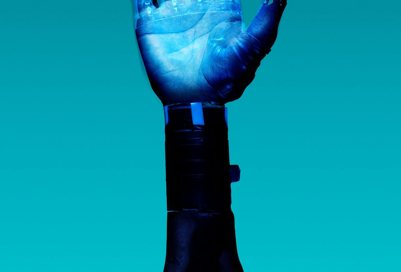 Prosthetic Arm on Blue Background