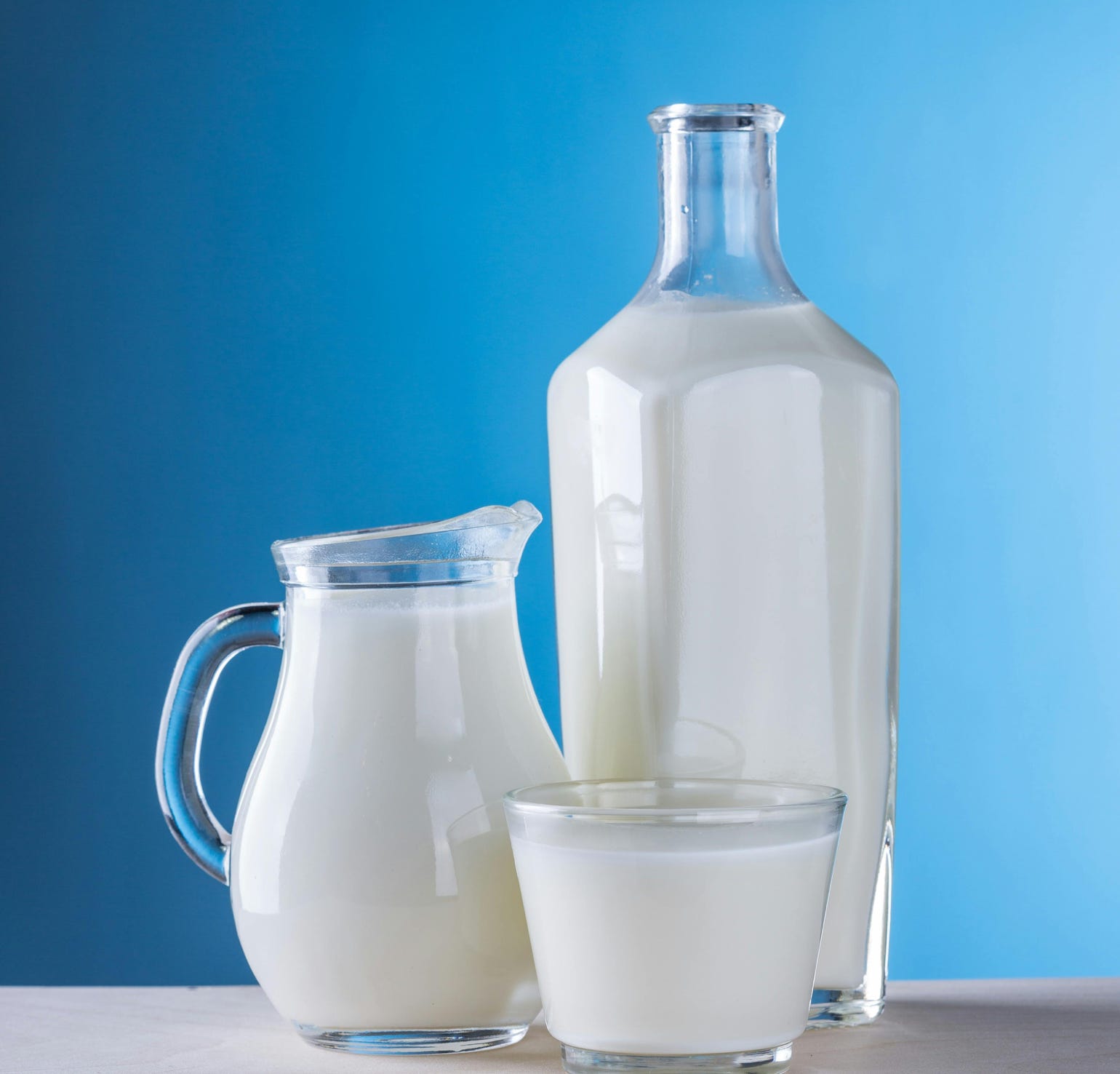 Close-up of Milk Against Blue Background